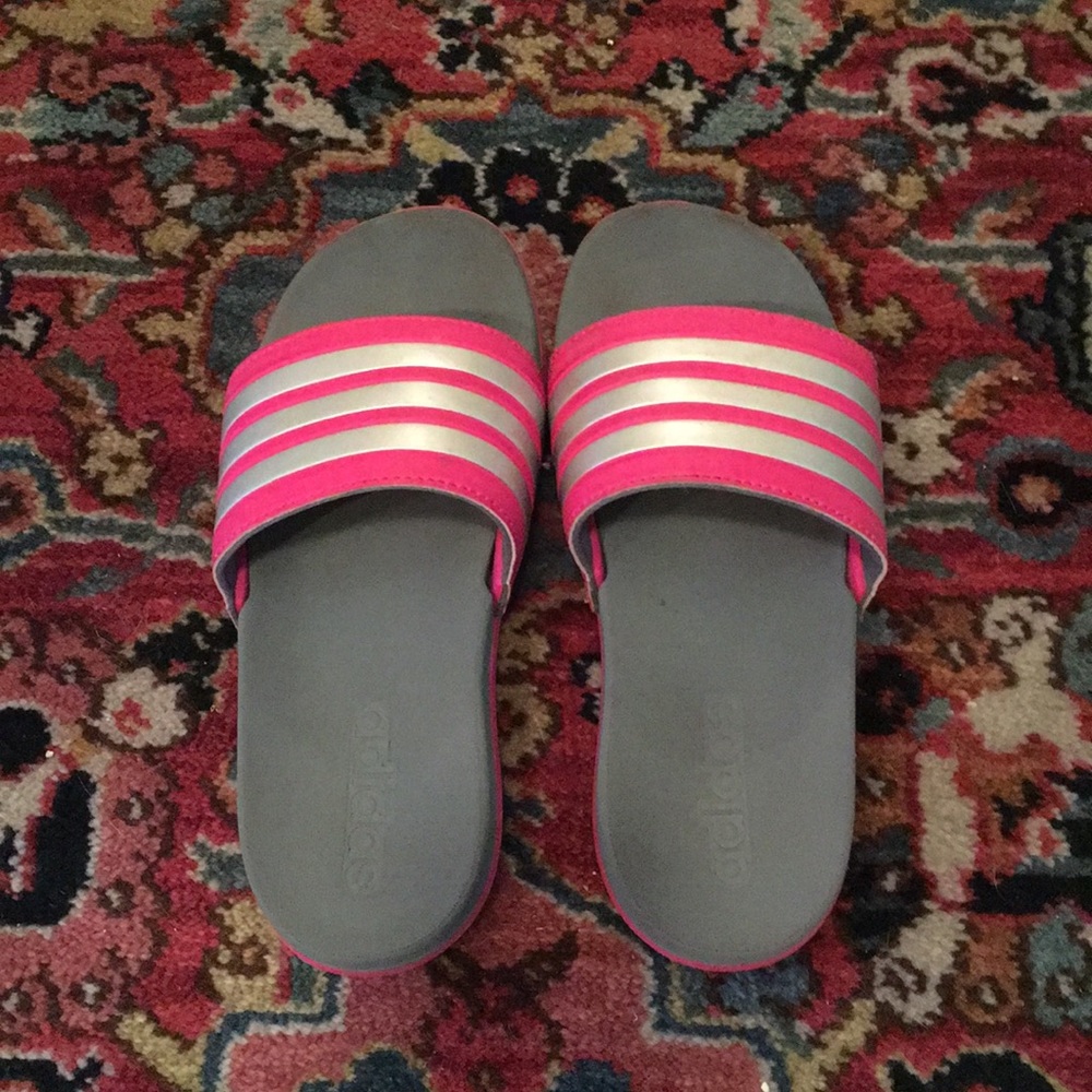 Adidas pink and silver slip on sandals.